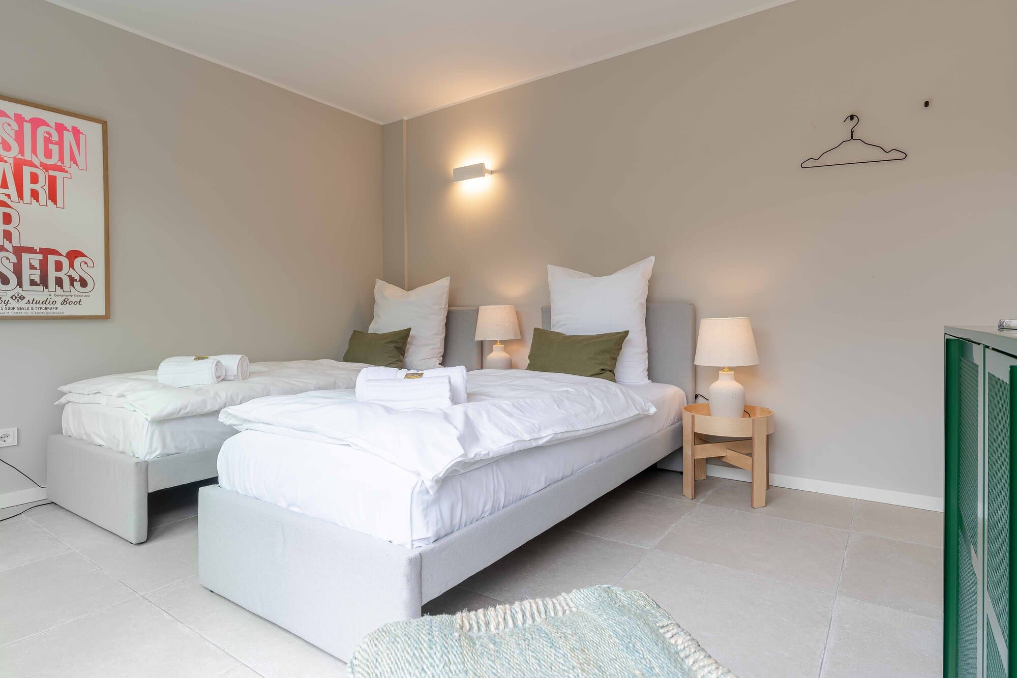 Second bedroom with two single beds 90 × 200 cm in a twin configuration